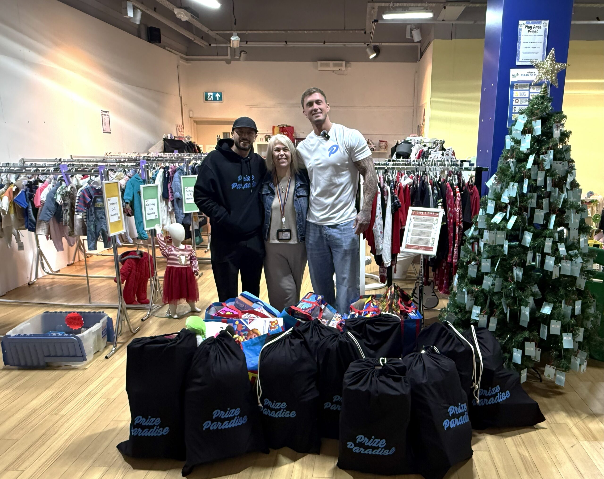 Dan and Hak's presenting charity donations to KIDECO Lakeside